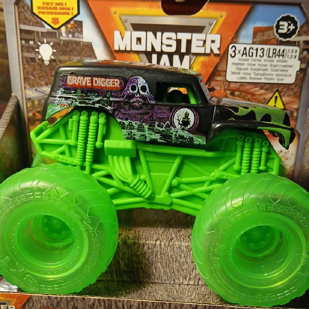 Grave Digger Toy Truck - Green and Black Lights In Wheels. 1/43 Scale Size